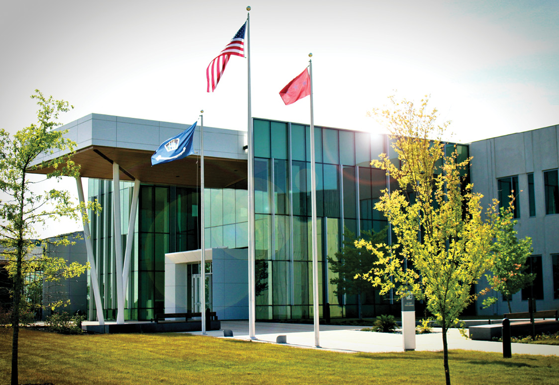 Fortitude Hall, the headquarters of U.S. Army Cyber Command, fosters a
        highly collaborative work environment for high-tech professionals with
        state-of-the-art audio and video workstations, video teleconference
        rooms, and small group meeting spaces throughout its open-concept work
        centers. (Photo courtesy of authors)